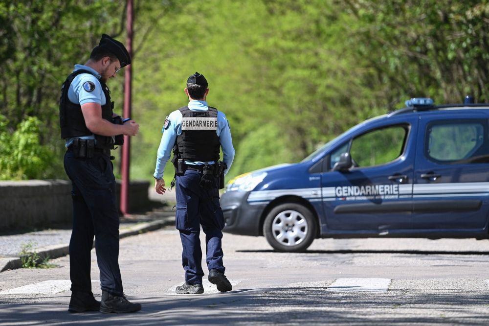 French gendarmes block the access to a road at La Grand-Combe, southern France, on April 25, 2025, after a muslim worshipper was stabbed to death at the local mosque. — AFP pic