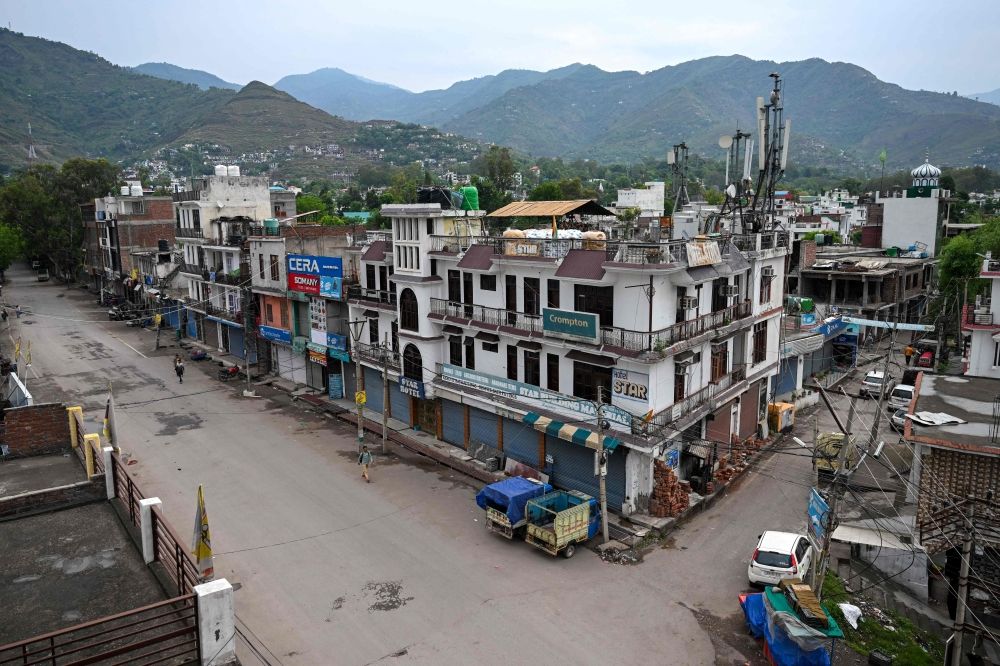 A deserted street is pictured after overnight artillery shelling in the Indian-run town of Poonch on May 9, 2025. — AFP pic