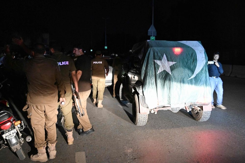 Pakistan accuses India of missile strikes on three military air bases Security personnel cordon off a road near Nur Khan military airbase after Indian strikes in Rawalpindi on May 10, 2025. Pakistan’s military on May 10 said India launched another wave of missiles targeting three air bases — including one on the outskirts of the capital — as the conflict between the nuclear-armed neighbours spiralled toward full-blown war. — AFP pic