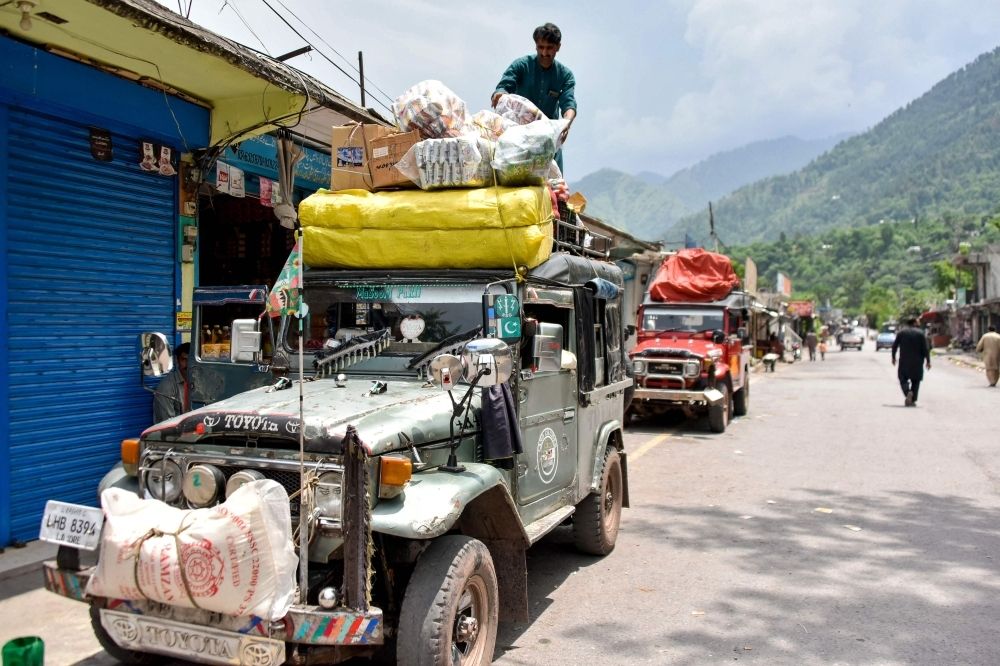 In Pakistan’s Chakothi, families emerge from bunkers as ceasefire holds — but few trust it will last A resident loads food and supplies on his vehicle as market reopened after Pakistan-India ceasefire at the frontier village of Chakothi near the Line of Control (LoC), in Pakistan-administered Kashmir May 11, 2025. — AFP pic