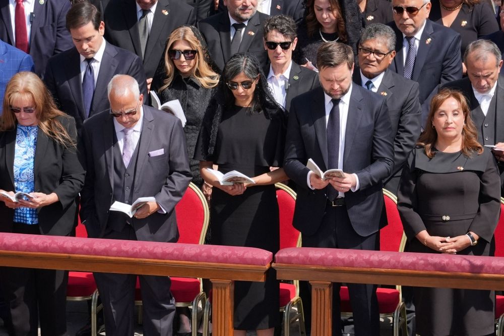 US Vice President JD Vance (2nd right) and his wife second Lady Usha Vance and Peru's President Dina Boluarte attend a Holy Mass for the Beginning of the Pontificate of Pope Leo XIV, in St Peter's square in The Vatican on May 18, 2025. — AFP pic