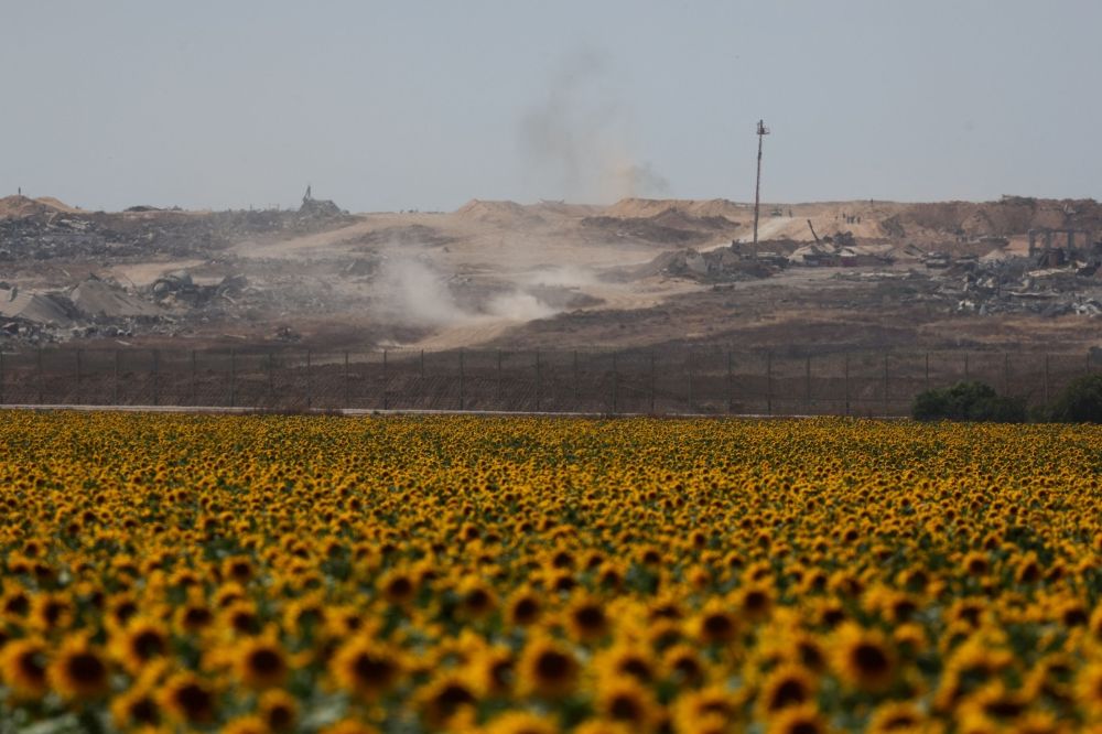 Smoke rises in Gaza following military activity, as seen from the Israeli side of the Israel-Gaza border, May 19, 2025. — Reuters pic