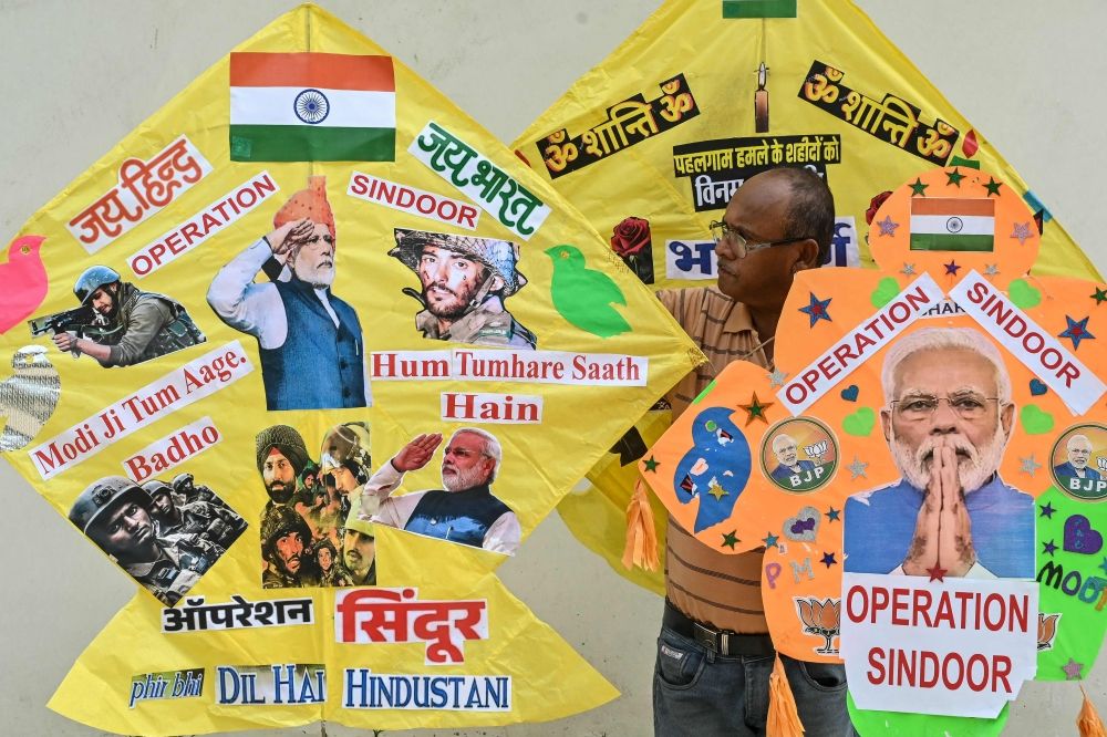 A kitemaker displays kites featuring Indian Prime Minister Narendra Modi and 'Operation Sindoor', India's military operation against Pakistan, in Amritsar on May 18, 2025. — AFP pic