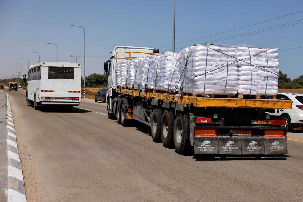A view of an aid truck entering from Israel into Gaza, on the road to the Kerem Shalom crossing near the Israeli-Gaza border, May 21, 2025. — Reuters pic