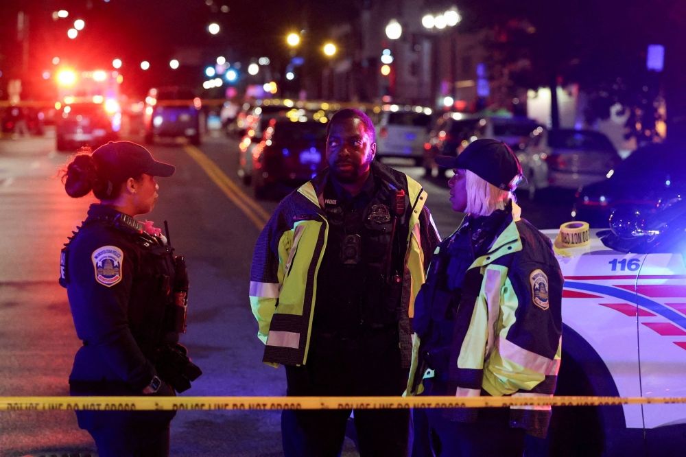 Police officers work at the site where, according to the US Homeland Security Secretary, two Israeli embassy staff were shot dead near the Capital Jewish Museum in Washington, D.C. May 21, 2025. — Reuters pic