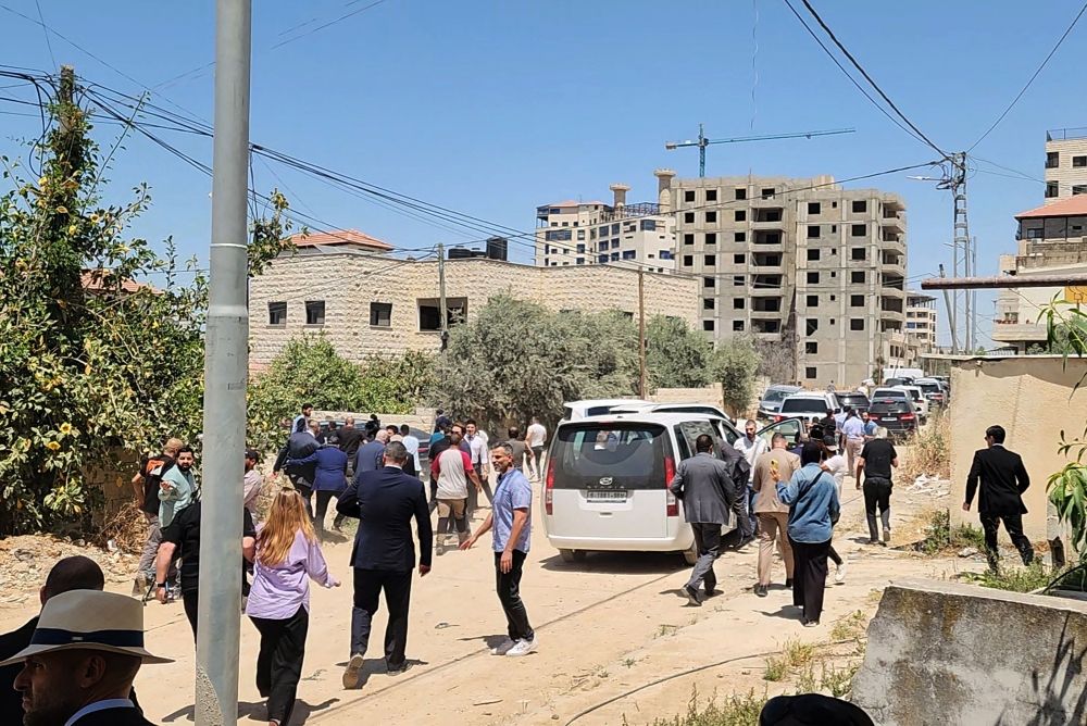 Members of a diplomatic delegation from the European Union leave in a rush after shots were fired as they gathered at the eastern entrance of Jenin camp during a visit to the city of Jenin, on May 21, 2025, amid an ongoing Israeli military offensive in the occupied West Bank. — AFP pic