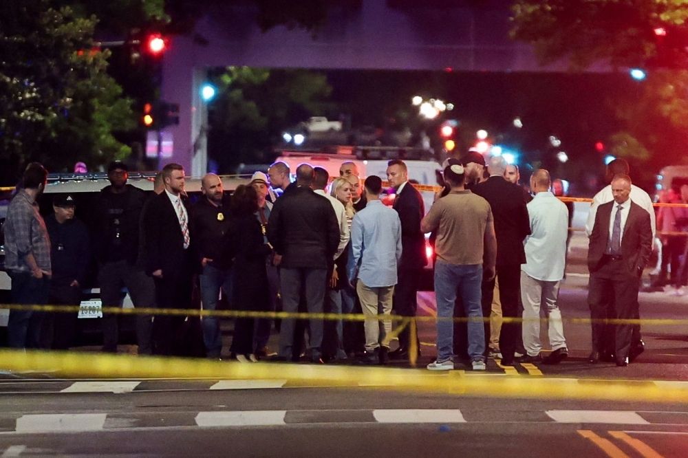 Lone suspect held in Washington shooting that killed two Israeli embassy staffers, security measures tightened worldwide US Attorney General Pam Bondi and Israeli Ambassador to the US Yechiel Leiter speak to the law enforcement officials as they visit the site where, according to the US Homeland Security Secretary, two Israeli embassy staff were shot dead near the Capital Jewish Museum in Washington, D.C. May 22, 2025. — Reuters pic
