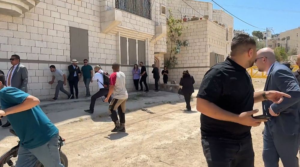 Diplomats scramble for cover as Israeli troops fire warning shots in West Bank, triggering international outrage This frame grab from AFPTV footage shows members of a diplomatic delegation from the European Union reacting after shots were fired as they gathered in the eastern entrance of Jenin camp during a visit to the city of Jenin, on May 21, 2025, amid an ongoing Israeli military offensive in the occupied West Bank. The Palestinian Authority accused Israeli forces of firing on diplomats as they visited the flashpoint West Bank city of Jenin on May 21, releasing video of two soldiers aiming rifles at a group of people. — AFPTV/AFP pic