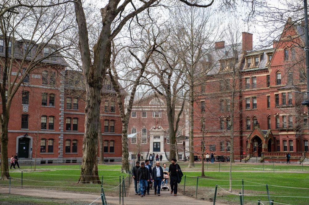 People walk through Harvard Yard on the Harvard University campus in Cambridge, Massachusetts, on April 15, 2025. US President Donald Trump's administration on Thursday revoked Harvard's right to enroll foreign students -- more than a quarter of its annual enrollment -- in a major escalation of the president's fight with one of the world's most storied universities. — AFP pic