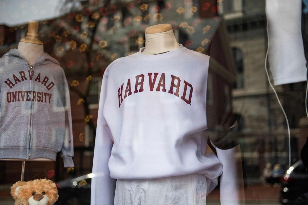 ‘Everyone’s panicking a bit’: US govt revokes Harvard’s right to enrol foreign students, university calls move ‘unlawful’ Harvard sweatshirts are displayed for sale in a school store window on the Harvard University campus in Cambridge, Massachusetts, on April 15, 2025. — AFP pic