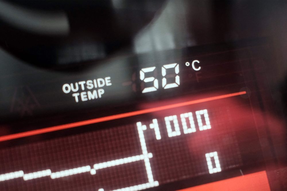 A dashboard display shows an external temperature of 50 degrees Celsius outside a vehicle in Dubai May 23, 2025. — AFP pic