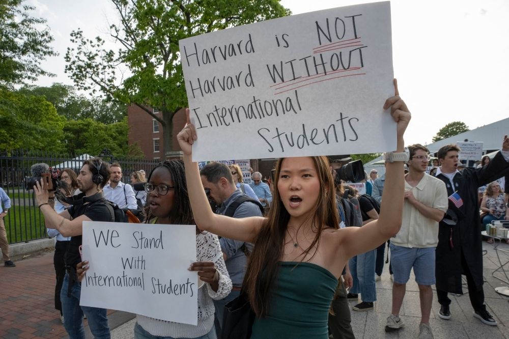 ‘Trump = traitor’: US revokes Harvard’s visa rights and axes US$100m in contracts, as hundreds of students stage protest People hold up signs during the Harvard Students for Freedom rally in support of international students at the Harvard University campus in Boston, Massachusetts, on May 27, 2025. — AFP pic