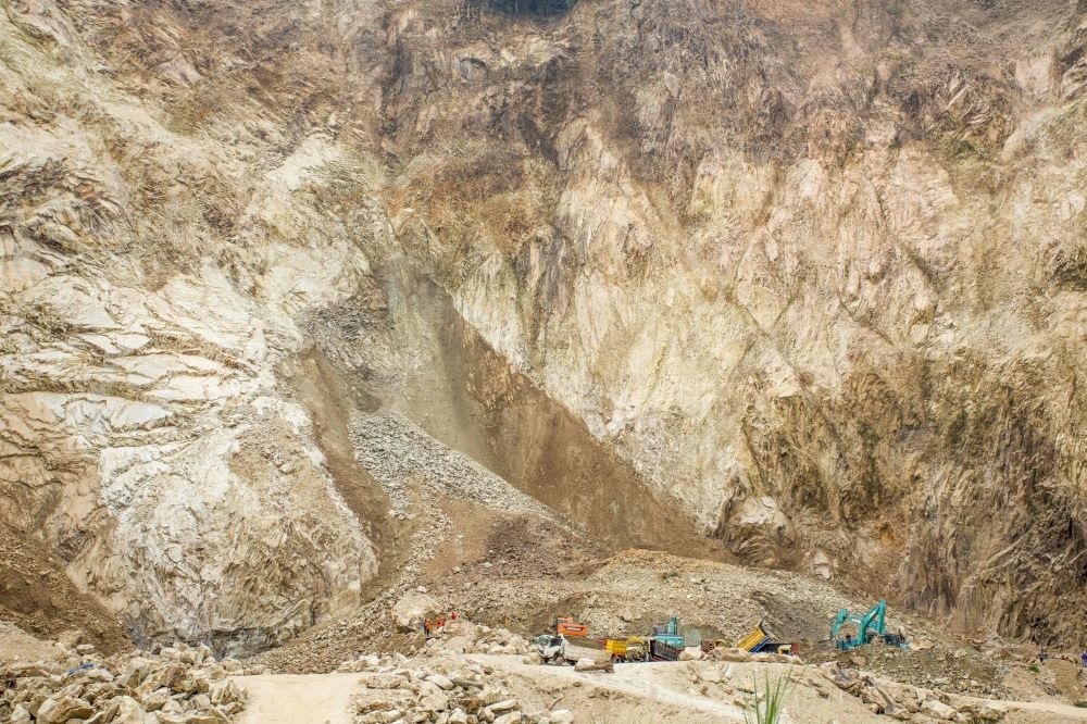 Rescuers use heavy equipment to search for landslide victims buried under rocks at the C excavation site in Cipanas, Dukupuntang, Cirebon Regency, West Java May 30, 2025. — AFP pic