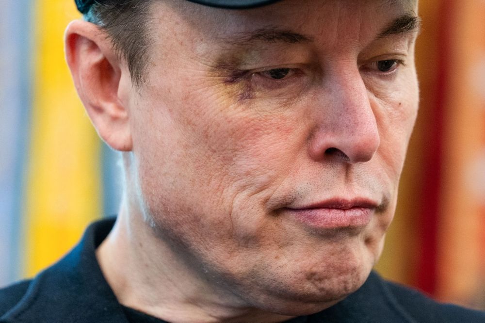 Elon Musk looks on during a news conference with US President Donald Trump in the Oval Office of the White House in Washington, DC May 30, 2025. — AFP pic