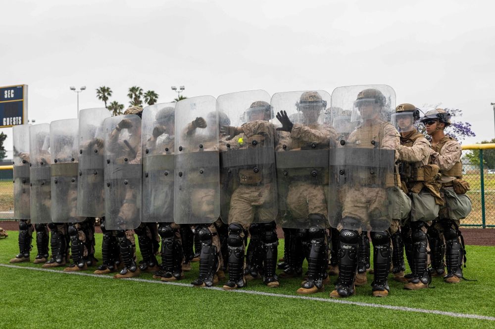 This handout photo taken and released by the US Marine Corps on June 10, 2025 shows US Marines with 2nd Battalion, 7th Marine Regiment, 1st Marine Division, who were placed in an alert status over the weekend to support US Northern Command mission, rehearsing nonlethal tactics in the greater Los Angeles area. — AFP pic