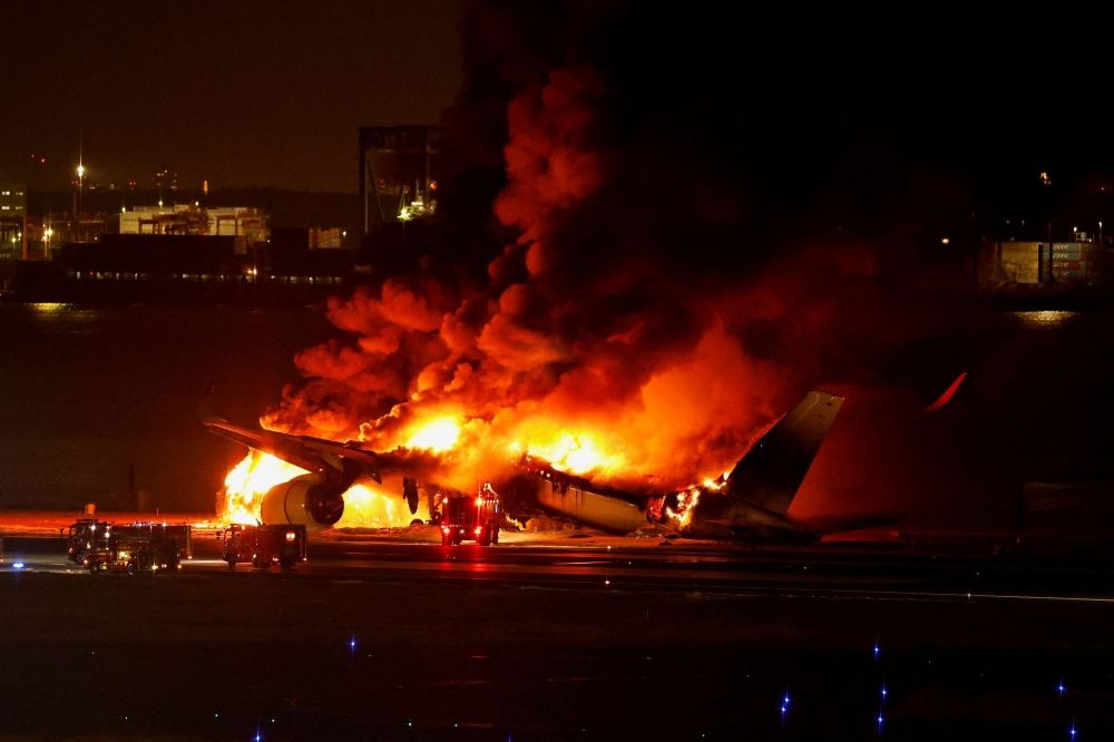 Japan Airlines' A350 airplane is on fire at Haneda international airport in Tokyo January 2, 2024. — Reuters pic