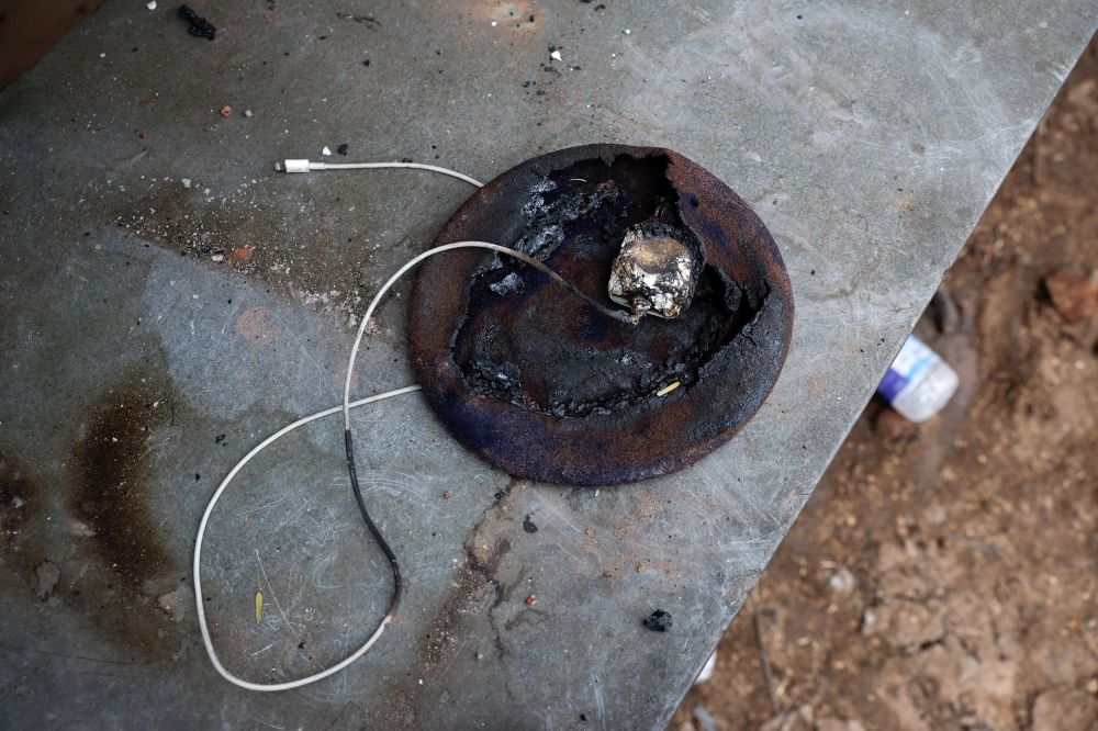 A burnt charger is seen at the crash site of Air India Boeing 787-8 Dreamliner plane, that crashed during take-off from an airport, in Ahmedabad, India, June 13, 2025. — Reuters pic