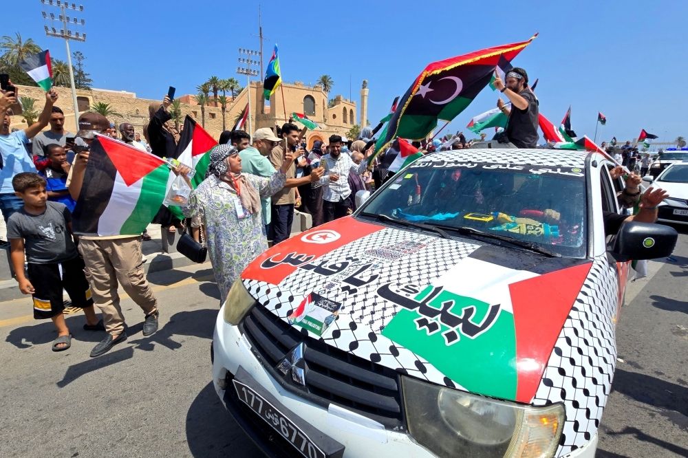 March to Gaza halted in Egypt as authorities crack down on activists Activists, heading towards Gaza by land with the aim of breaking the siege on the Palestinian territory, are greeted by Libyans in Tripoli’s Martyrs Square on June 11, 2025. — AFP pic