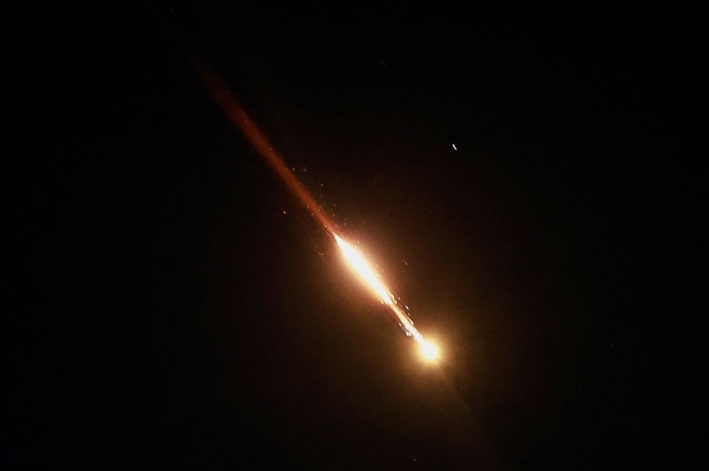Israel, Iran exchange missile barrages as Israel aims to wipe out Tehran’s nuclear programme A missile launched from Iran is seen from Jerusalem, June 14, 2025. — Reuters pic