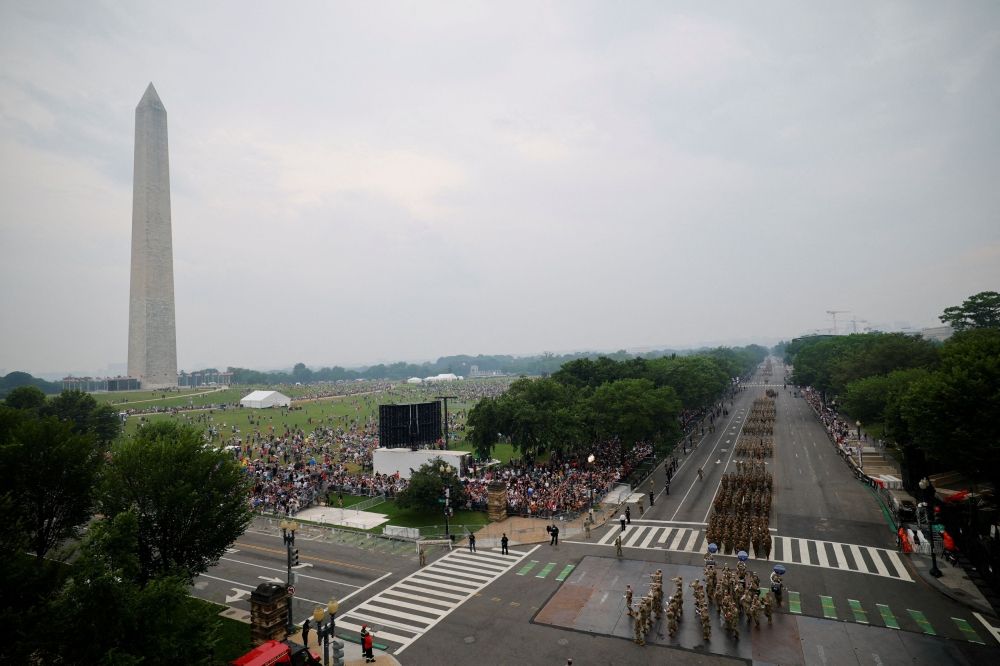 Soldiers march near the Washington Monument during a military parade to commemorate the U.S. Army's 250th Birthday in Washington, D.C. June 14, 2025. — Reuters pic