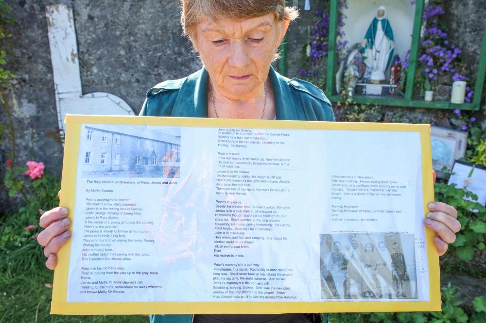 Historian Catherine Corless poses on the site of the former St Mary's Mother and Baby Home, in Tuam, in the outskirts of Galway, western Ireland, a site believed to be containing a mass grave of children and mothers, on May 20, 2025. — AFP pic
