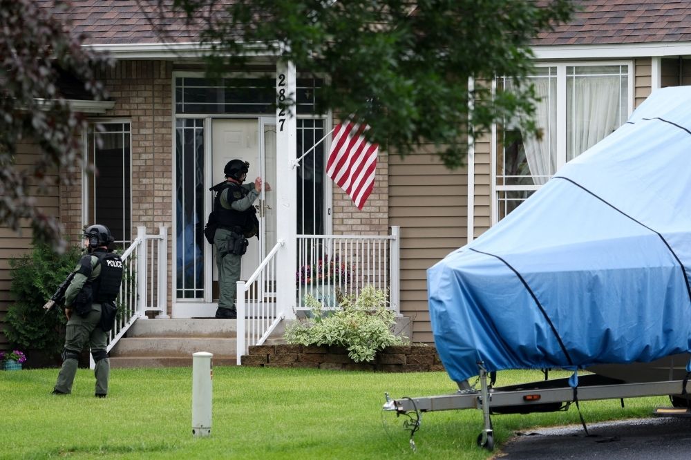 ‘Armed and dangerous’: Manhunt underway after gunman kills Minnesota lawmaker and husband, wounds another in attacks Officers canvas the neighbourhood after what police said was a targeted shooting in the area around Edinburgh Golf Course in the Minneapolis suburb of Brooklyn Park, Minnesota June 14, 2025. — Reuters pic