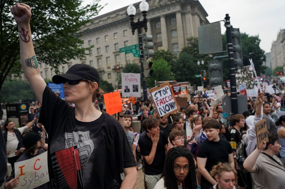 Demonstrators take part in a protest on the day of a military parade commemorating the US Army’s 250th Birthday in Washington, D.C. June 14, 2025. — Reuters pic