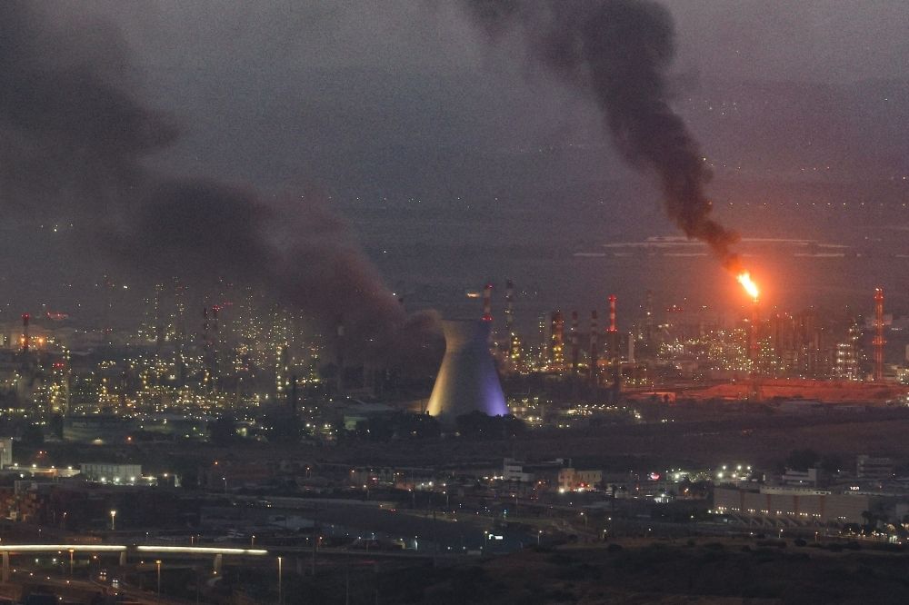 Tel Aviv, Tehran burn as Israel-Iran tension enters bloodiest phase; five dead in latest missile strikes Smoke billows from a site in the city of Haifa on June 16, 2025, following a fresh barrage of Iranian missiles. — AFP pic