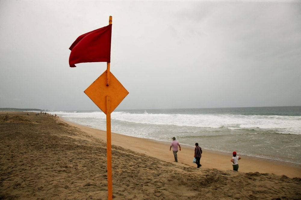 Hurricane Erick barrels toward Mexico’s Pacific coast, bringing destructive winds, deadly floods and 10-metre waves A red flag flutters in the wind, warning beachgoers of dangerous conditions as Hurricane Erick strengthens off Mexico's Pacific Coast, in Puerto Escondido, Oaxaca state, Mexico, June 18, 2025. — Reuters pic