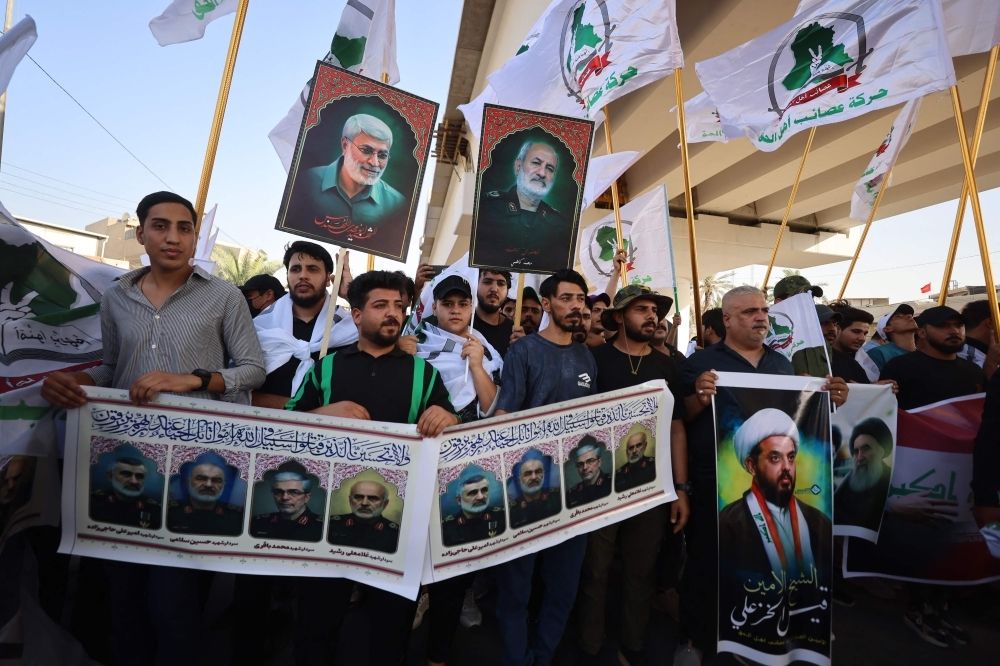 Who are Iran’s Revolutionary Guards? Key facts about the elite military force behind Tehran’s military strategy and regional influence Supporters of Iraqi pro-Iran groups hold pictures of Iranian Revolutionary Guard commanders killed in the Israeli airstrikes in Tehran during a protest in Baghdad near the green zone, the ultra secured neighbourhood hosting the US embassy, on June 16, 2025, amid the Israel-Iran escalating conflict. — AFP pic