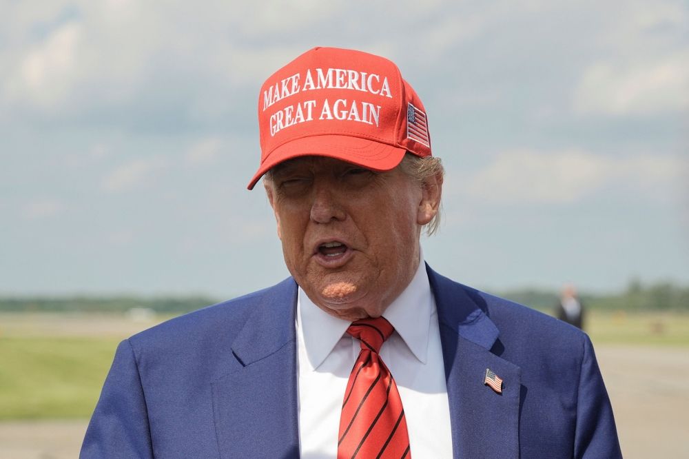 US President Donald Trump speaks to reporters upon his arrival at Morristown Municipal Airport in Morristown, New Jersey, June 20, 2025. — Reuters pic