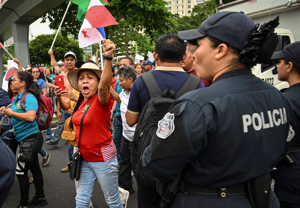 A woman shouts slogans during a rally against the government of Panama’s President Jose Raul Mulino in Panama City June 20, 2025. — AFP