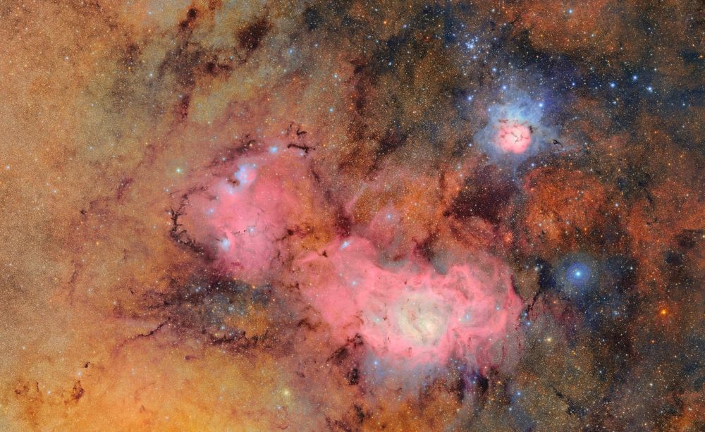 This undated handout image released by NSF-DOE on June 20, 2025 shows a combination of 678 separate images taken by NSF-DOE Vera C. Rubin Observatory in just over seven hours of observing time. Combining many images in this way clearly reveals otherwise faint or invisible details, such as the clouds of gas and dust that comprise the Trifid nebula (top right) and the Lagoon nebula, which are several thousand light-years away from Earth. — NSF-DOE Vera C. Rubin Observatory handout/AFP pic