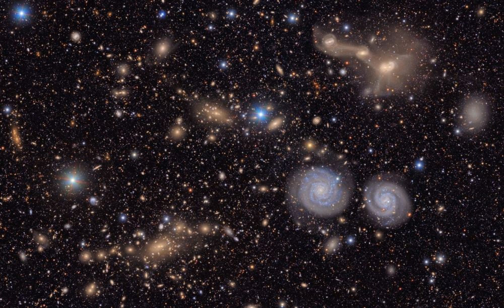 From nebulae to near-Earth asteroids, groundbreaking Vera Rubin Observatory unveils dazzling first images of deep space This undated handout image released by NSF-DOE on June 20, 2025 shows another small section of NSF-DOE Vera C. Rubin Observatory's total view of the Virgo cluster. Visible are two prominent spiral galaxies (lower right), three merging galaxies (upper right), several groups of distant galaxies, many stars in the Milky Way galaxy and more. More than two decades in the making, the giant telescope, funded by the US National Science Foundation and the US Department of Energy is perched at the summit of Cerro Pachon in central Chile, where dark skies and dry air provide ideal conditions for observing the cosmos. — NSF-DOE Vera C. Rubin Observatory handout/AFP pic