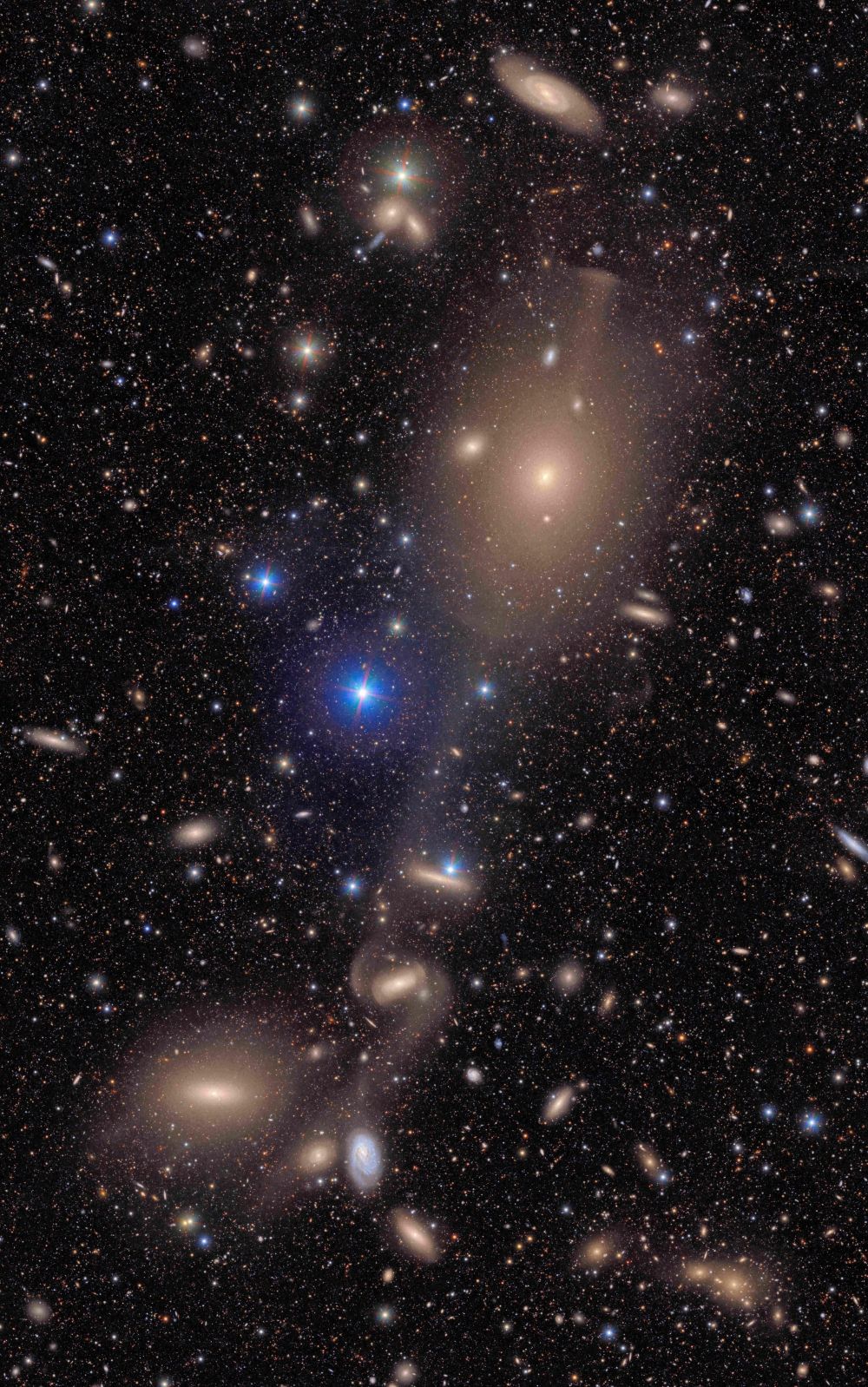 This undated handout image released by NSF-DOE on June 20, 2025 shows a small section of NSF-DOE Vera C. Rubin Observatory's total view of the Virgo cluster. Bright stars in the Milky Way galaxy shine in the foreground, and many distant galaxies are in the background taken by the Vera C. Rubin Observatory. The team behind the long-awaited Vera Rubin Observatory in Chile published their first images on June 23, 2025, revealing breathtaking views of star-forming regions as well as distant galaxies. — NSF-DOE Vera C. Rubin Observatory handout/AFP pic