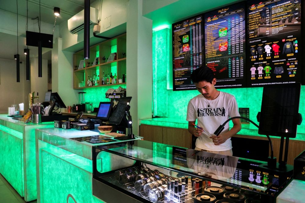 — Reuters pic Punnathat Phutthisawong, a staff member at a cannabis shop called ‘Green House Thailand’ arranges cannabis inside his shop on Khaosan Road, one of the favourite tourist spots in Bangkok, Thailand, June 25, 2025. — Reuters pic