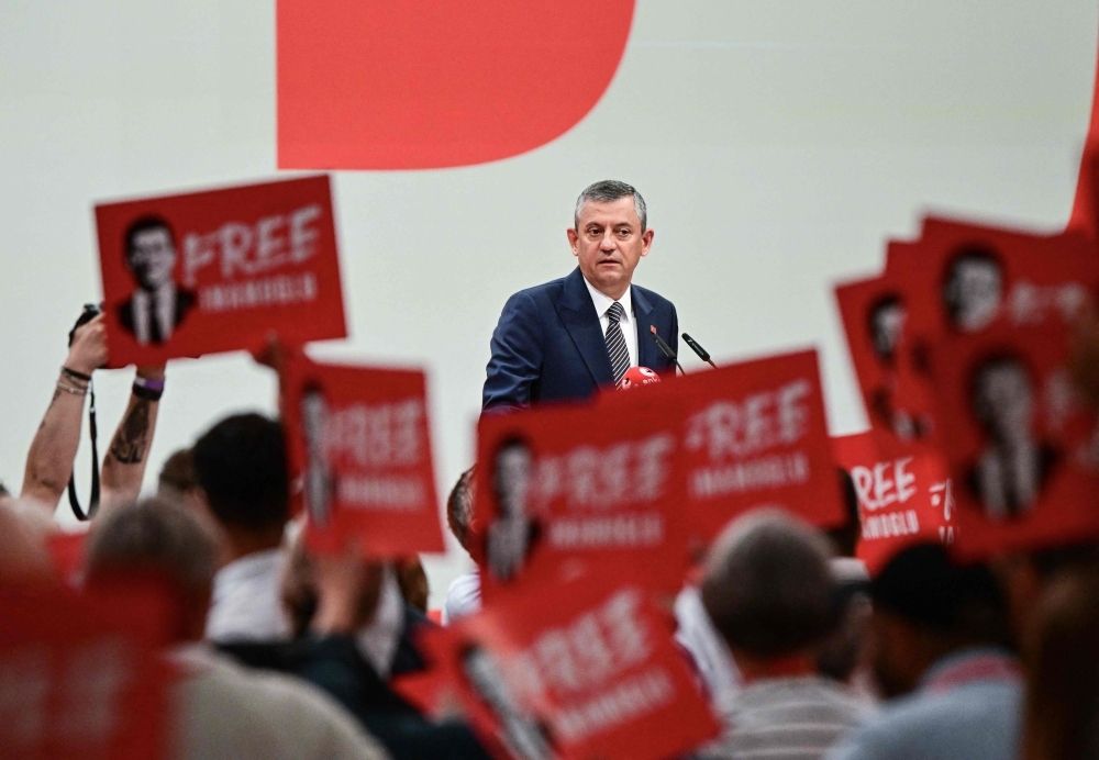 Istanbul mayor jailed and protests rage: Aftermath as Erdogan eyes compliant opposition in Turkiye’s leadership shake-up The leader of Turkey's main opposition Republican People's Party (CHP) Ozgur Ozel speaks on stage as attendees hold placards reading