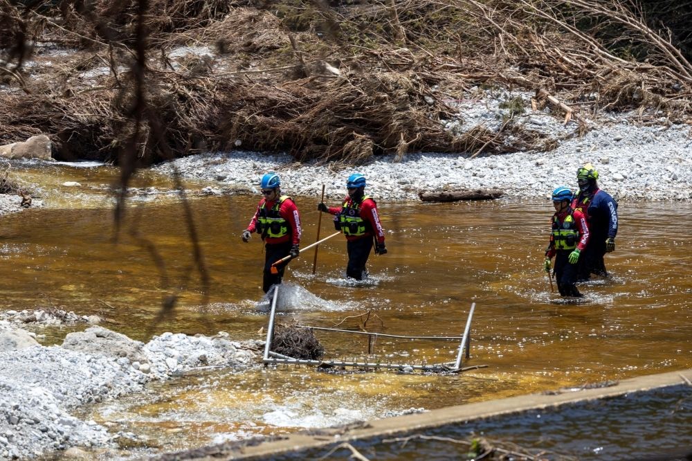 Scrutiny grows over Texas flood response as death toll hits 120, 170 still missing Search and rescue team members look for missing people in the waters of the Guadalupe River, near Camp Mystic, following deadly flooding, in Hunt, Texas July 10, 2025. — Reuters pic