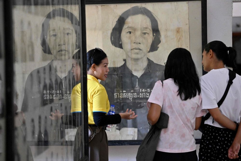 Tourists at the Tuol Sleng Genocide Museum. — AFP pic Tourists at the Tuol Sleng Genocide Museum. — AFP pic