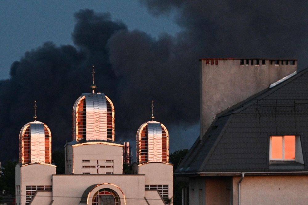 Smoke billows above the city's buildings following mass Russian drone and missile strikes in the western Ukrainian city of Lviv on July 12, 2025, amid the Russian invasion of Ukraine. — AFP pic Smoke billows above the city's buildings following mass Russian drone and missile strikes in the western Ukrainian city of Lviv on July 12, 2025, amid the Russian invasion of Ukraine. — AFP pic