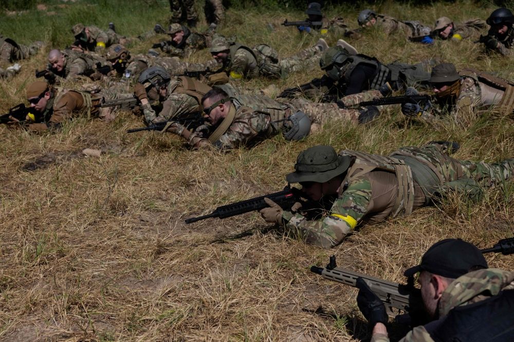 Civilians wearing military uniforms take part in a military training organised by Ukrainian soldiers of The Third Separate Assault Brigade in Kyiv region on July 12, 2025, amid the Russian invasion of Ukraine. — AFP pic Civilians wearing military uniforms take part in a military training organised by Ukrainian soldiers of The Third Separate Assault Brigade in Kyiv region on July 12, 2025, amid the Russian invasion of Ukraine. — AFP pic