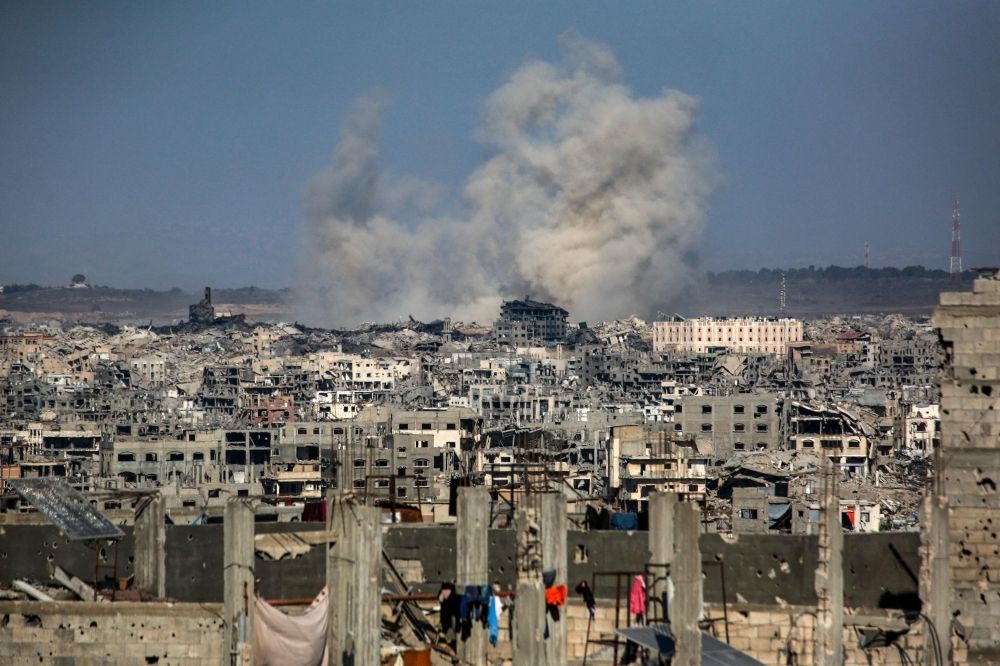 Is Gaza’s ‘humanitarian city’ plan ethnic cleansing? Mediators struggle as death toll rises, hostages remain in limbo This picture taken from western Jabalia in the central Gaza Strip shows smoke billowing east of Gaza City, in the central Gaza Strip following Israeli strikes on July 13, 2025. — AFP pic