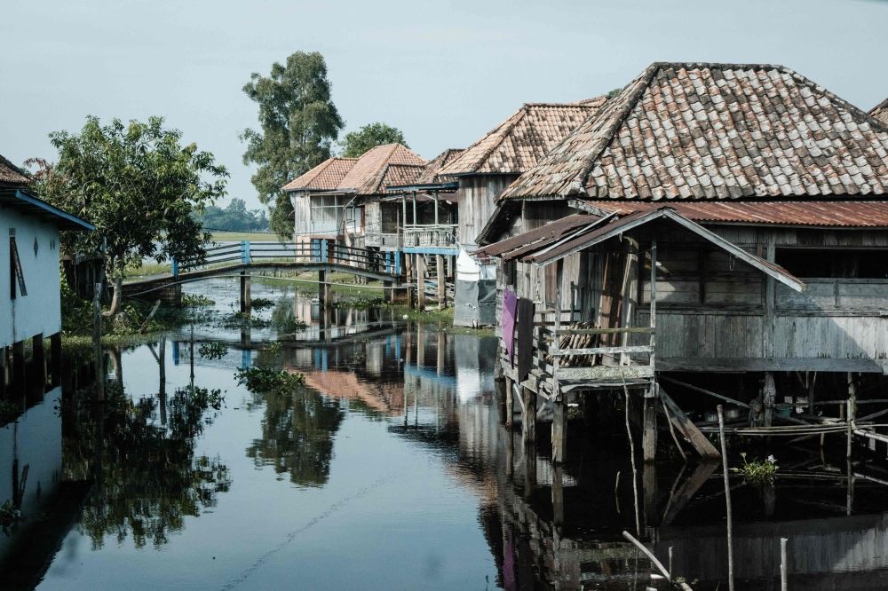 This photo taken on June 11, 2025 shows a general view of traditional raised stilt houses in Bangsal, South Sumatra. The Central Statistics Agency noted the significant gap between big cities and rural areas, with villages still seeing a higher poverty rate. — AFP pic This photo taken on June 11, 2025 shows a general view of traditional raised stilt houses in Bangsal, South Sumatra. The Central Statistics Agency noted the significant gap between big cities and rural areas, with villages still seeing a higher poverty rate. — AFP pic
