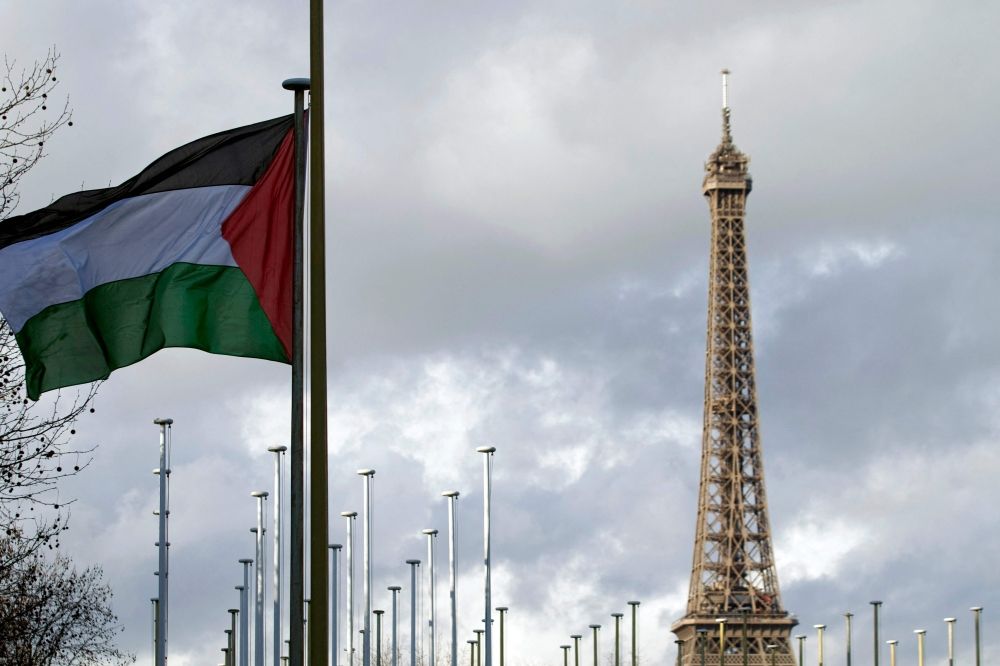 The Palestinian flag is raised for the first time (with the Eiffel tower in the background) on December 13, 2011 above a UN agency, the Unesco headquarters in Paris. France will recognise the State of Palestine at the United Nations General Assembly in New York this upcoming September, President Emmanuel Macron announced on his social networks on Thursday. — AFP pic The Palestinian flag is raised for the first time (with the Eiffel tower in the background) on December 13, 2011 above a UN agency, the Unesco headquarters in Paris. France will recognise the State of Palestine at the United Nations General Assembly in New York this upcoming September, President Emmanuel Macron announced on his social networks on Thursday. — AFP pic