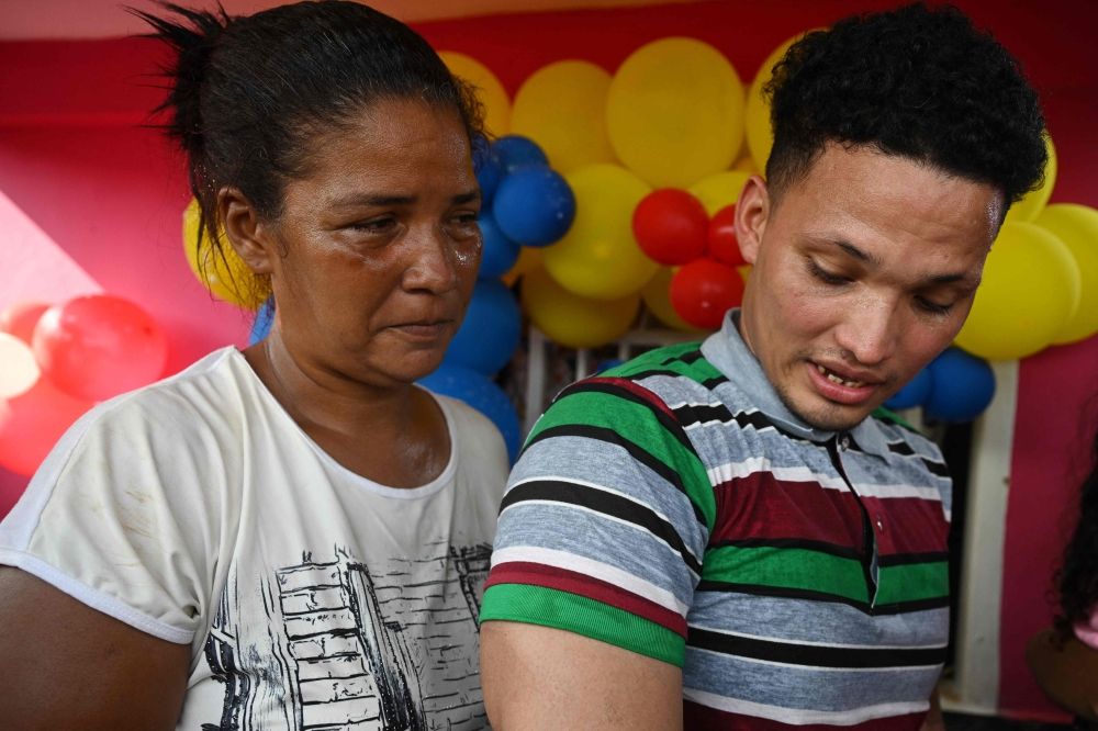 Mervin Yamarte, a Venezuelan migrant repatriated from a prison in El Salvador, is welcomed by his mother, Mercedes Yamarte, upon arrival at his home in Maracaibo, Venezuela, July 22, 2025. — AFP pic Mervin Yamarte, a Venezuelan migrant repatriated from a prison in El Salvador, is welcomed by his mother, Mercedes Yamarte, upon arrival at his home in Maracaibo, Venezuela, July 22, 2025. — AFP pic