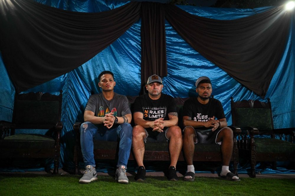(From left) Mervin Yamarte, Ringo Rincon and Edwuar Hernandez, Venezuelan migrants repatriated from a prison in El Salvador, attend a Christian evangelicals service in Los Pescadores neighbourhood in Maracaibo, Venezuela, July 23, 2025. — AFP pic (From left) Mervin Yamarte, Ringo Rincon and Edwuar Hernandez, Venezuelan migrants repatriated from a prison in El Salvador, attend a Christian evangelicals service in Los Pescadores neighbourhood in Maracaibo, Venezuela, July 23, 2025. — AFP pic