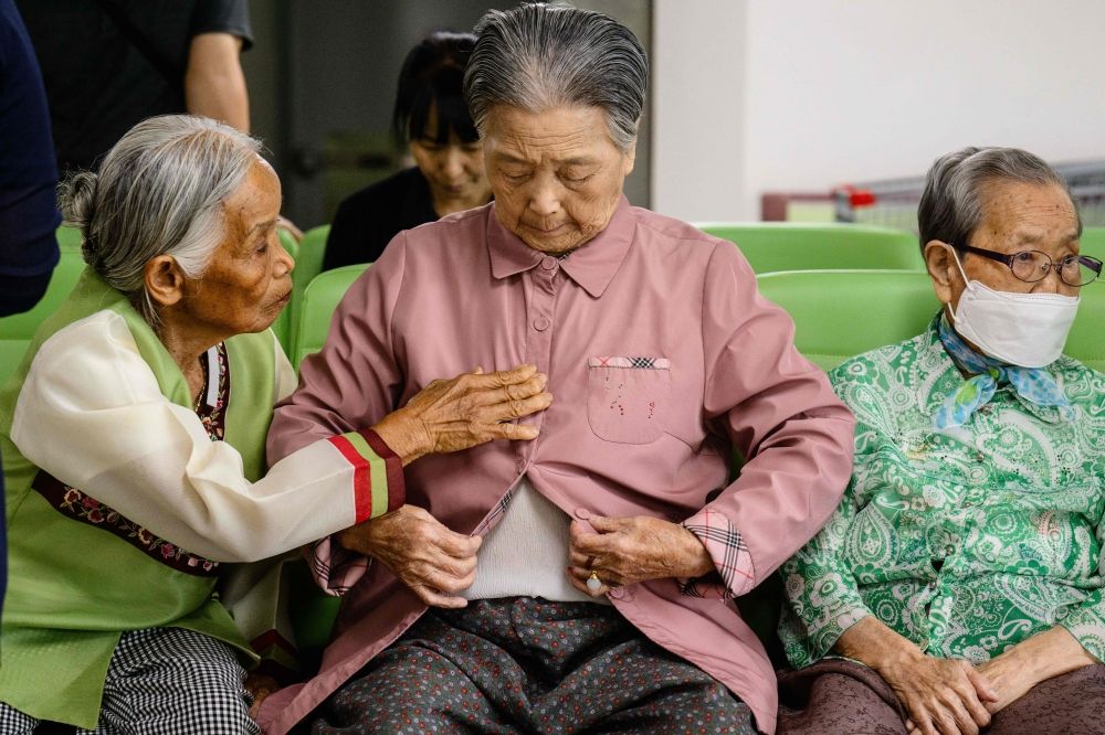 This photo shows residents preparing to have their portraits taken for use at their funerals at the Hapcheon Atomic Bomb Victim Welfare Center. — AFP pic This photo shows residents preparing to have their portraits taken for use at their funerals at the Hapcheon Atomic Bomb Victim Welfare Center. — AFP pic