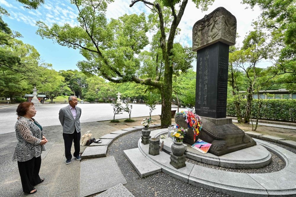 This photo taken on June 26, 2025 shows Kim Hwa-ja (front left), an ethnic Korean who is also an atomic bomb survivor, or ‘hibakusha’, and Kwon Joon-oh (2nd left), whose mother and father were also survivors, as they visit the ‘Monument in Memory of the Korean Victims of the A-bomb’, following an interview with AFP near the Peace Park Memorial in the city of Hiroshima, Hiroshima prefecture. — AFP pic This photo taken on June 26, 2025 shows Kim Hwa-ja (front left), an ethnic Korean who is also an atomic bomb survivor, or ‘hibakusha’, and Kwon Joon-oh (2nd left), whose mother and father were also survivors, as they visit the ‘Monument in Memory of the Korean Victims of the A-bomb’, following an interview with AFP near the Peace Park Memorial in the city of Hiroshima, Hiroshima prefecture. — AFP pic