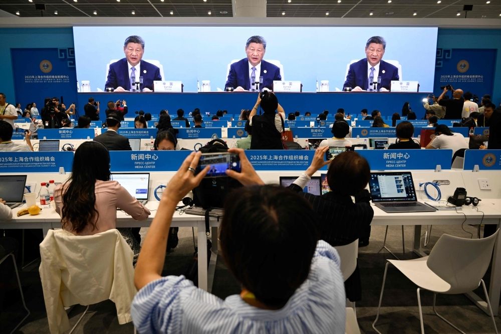 China’s Xi slams ‘bullying’ behaviour in world order Chinese President Xi Jinping is seen on a screen at the media centre during the opening ceremony of the Shanghai Cooperation Organisation (SCO) Summit in Tianjin September 1, 2025. — AFP pic