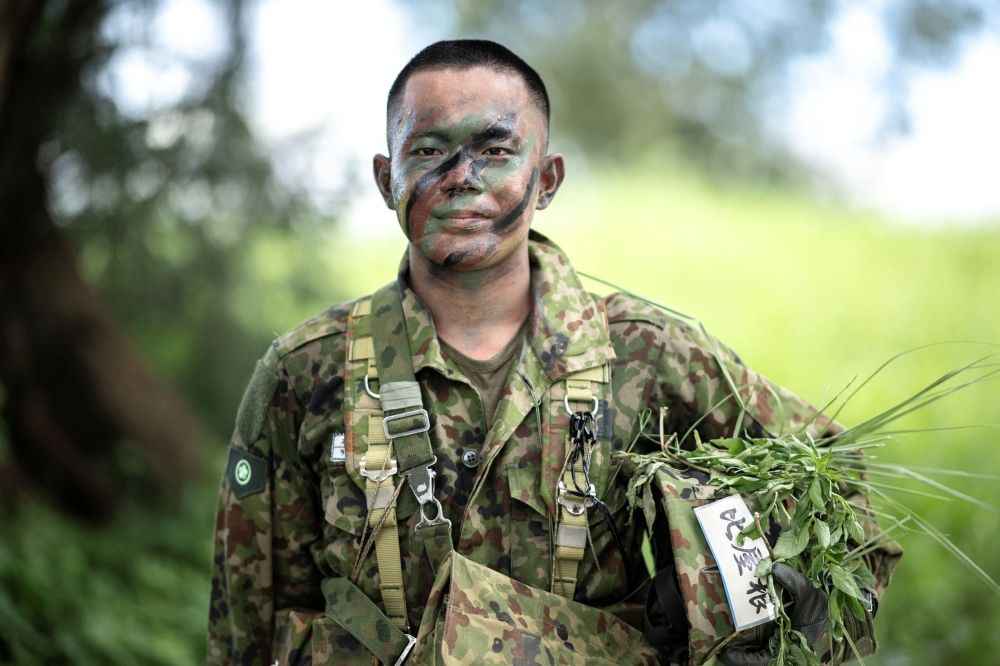 Takuma Hiyane, a newly-enlisted member of the Japan Ground Self-Defence Force (JGSDF), posing for a photograph following an exercise at JGSDF Camp Naha in Okinawa Prefecture June 9, 2025. — AFP pic Takuma Hiyane, a newly-enlisted member of the Japan Ground Self-Defence Force (JGSDF), posing for a photograph following an exercise at JGSDF Camp Naha in Okinawa Prefecture June 9, 2025. — AFP pic